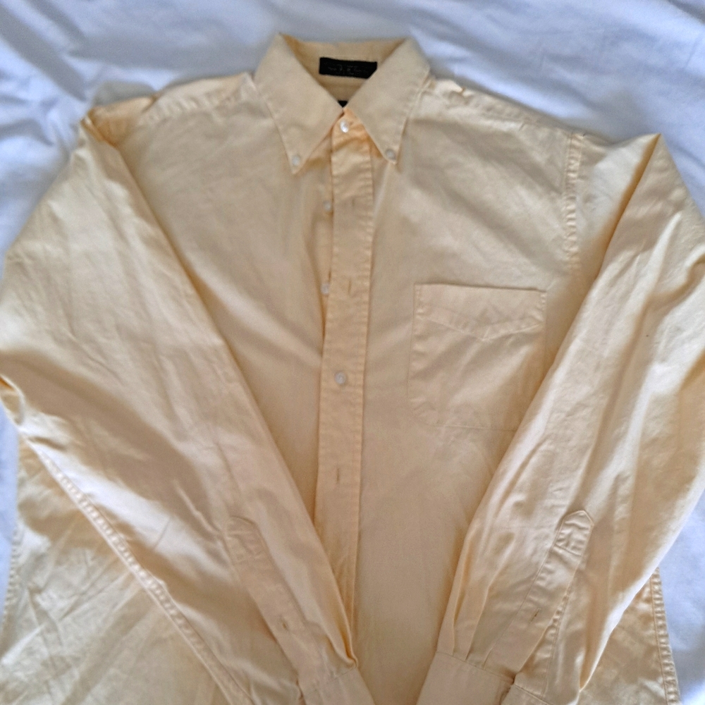 Warm yellow button down shirt.
